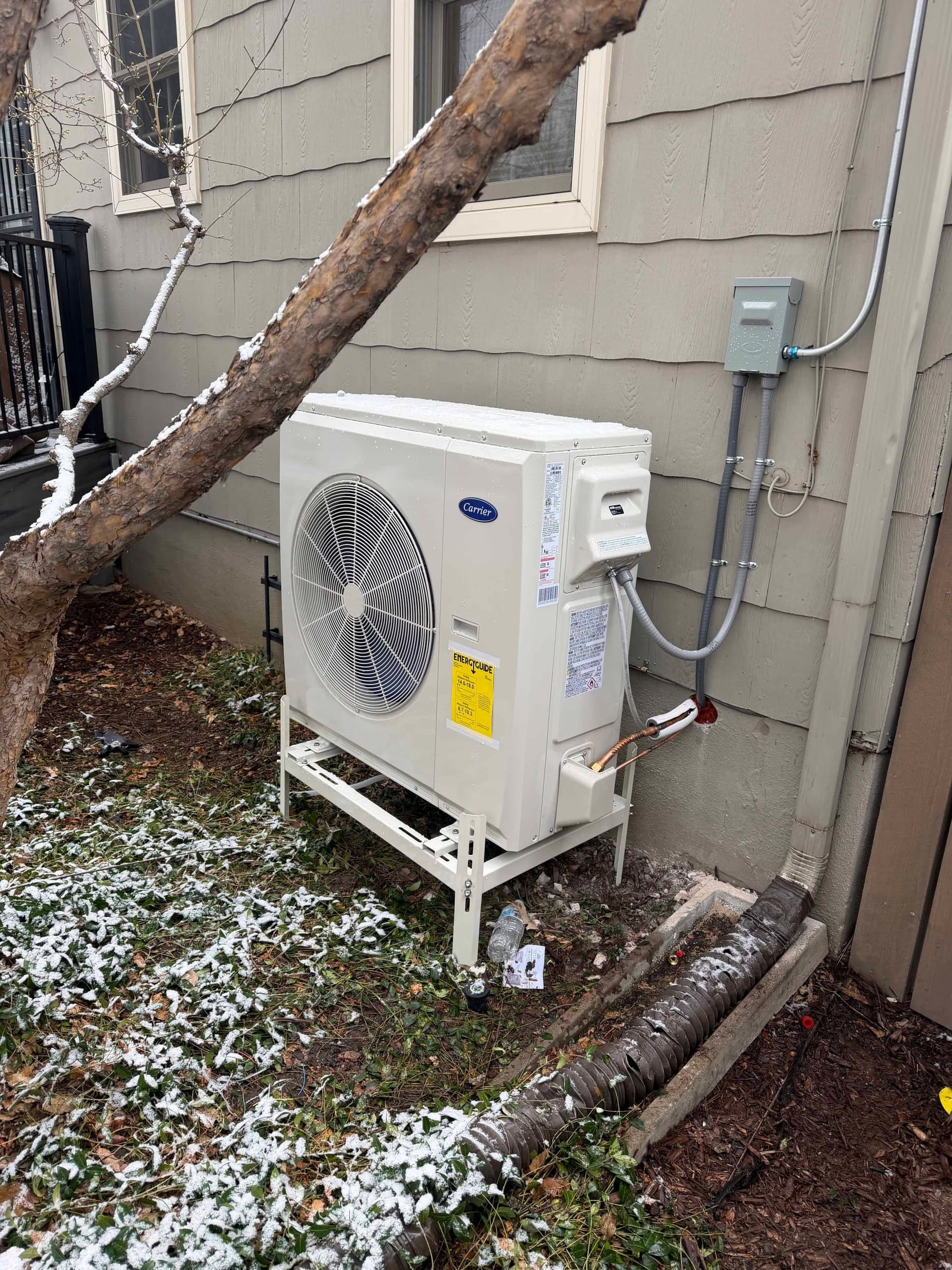 Carrier outdoor condenser in snow