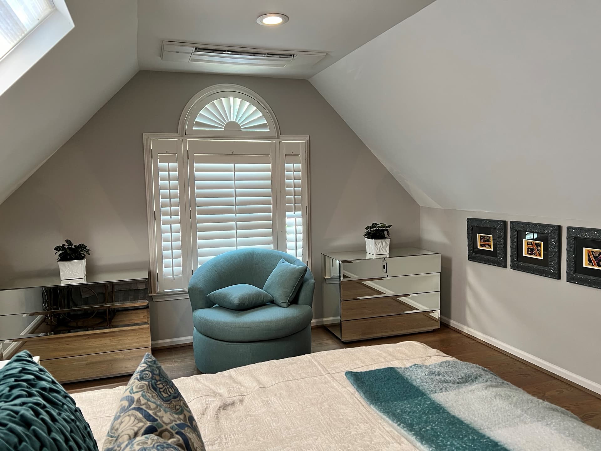 Mitsubishi ceiling-recessed mini split in a finished attic bedroom