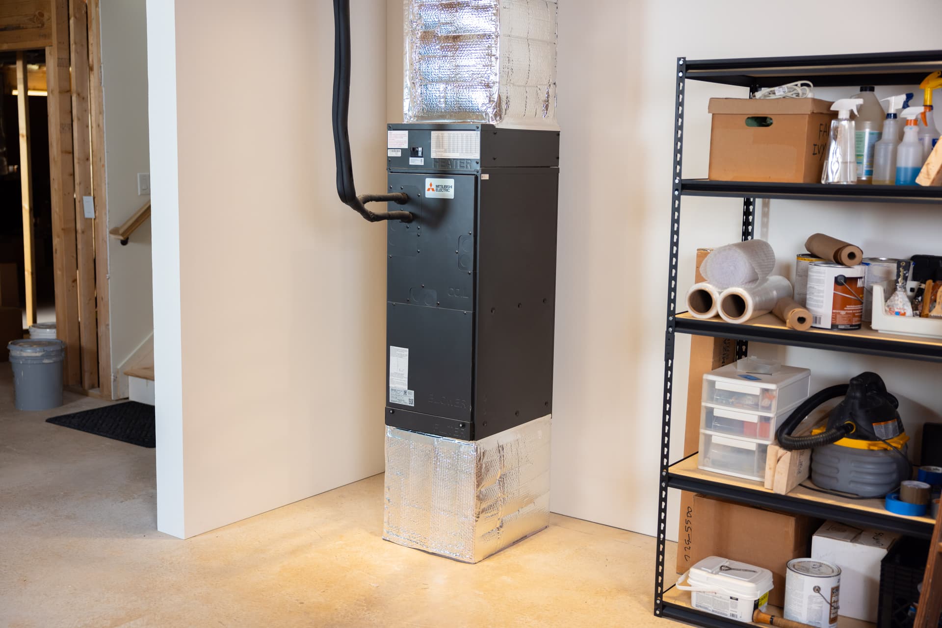 Mitsubishi SVZ electric air handler installed in a basement with no gas line or flue