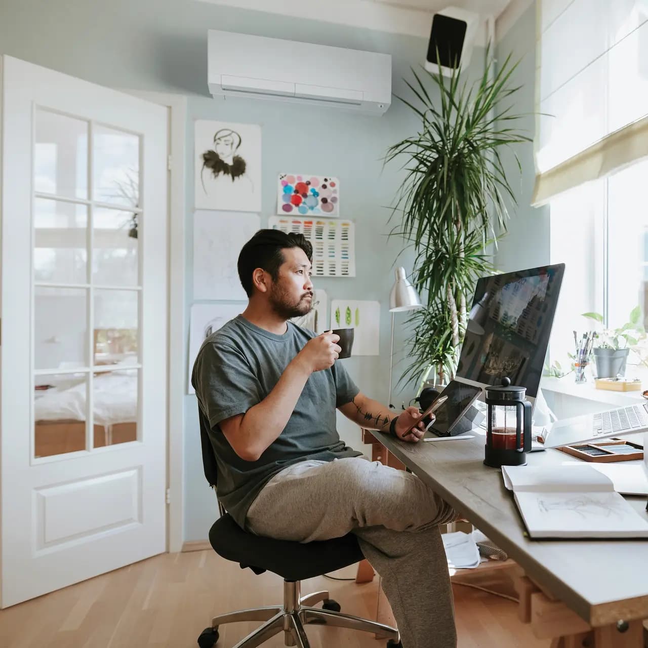 Mitsubishi FX wall-mounted mini-split indoor unit in a home office
