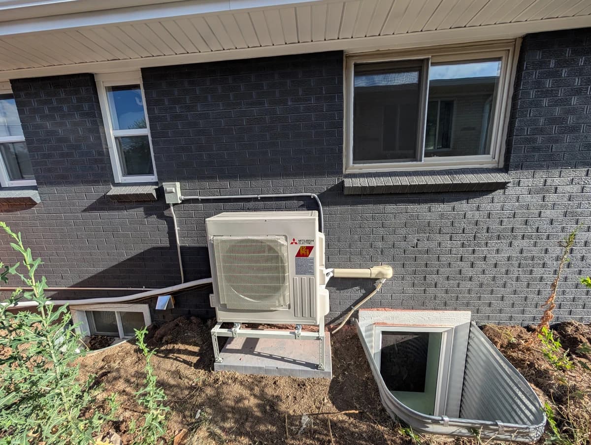 Mini-split outdoor unit at an Edgewater brick home