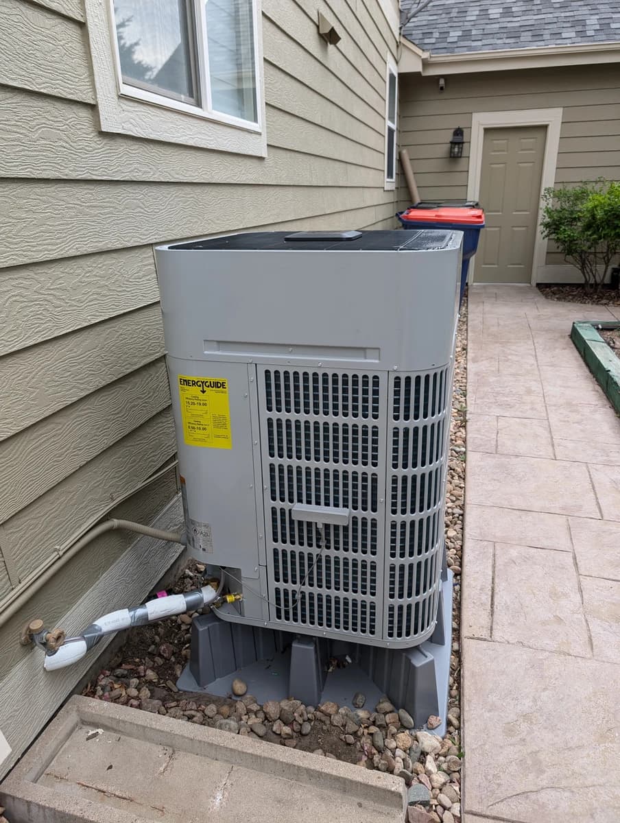 Heat pump installed in a Lone Tree side yard