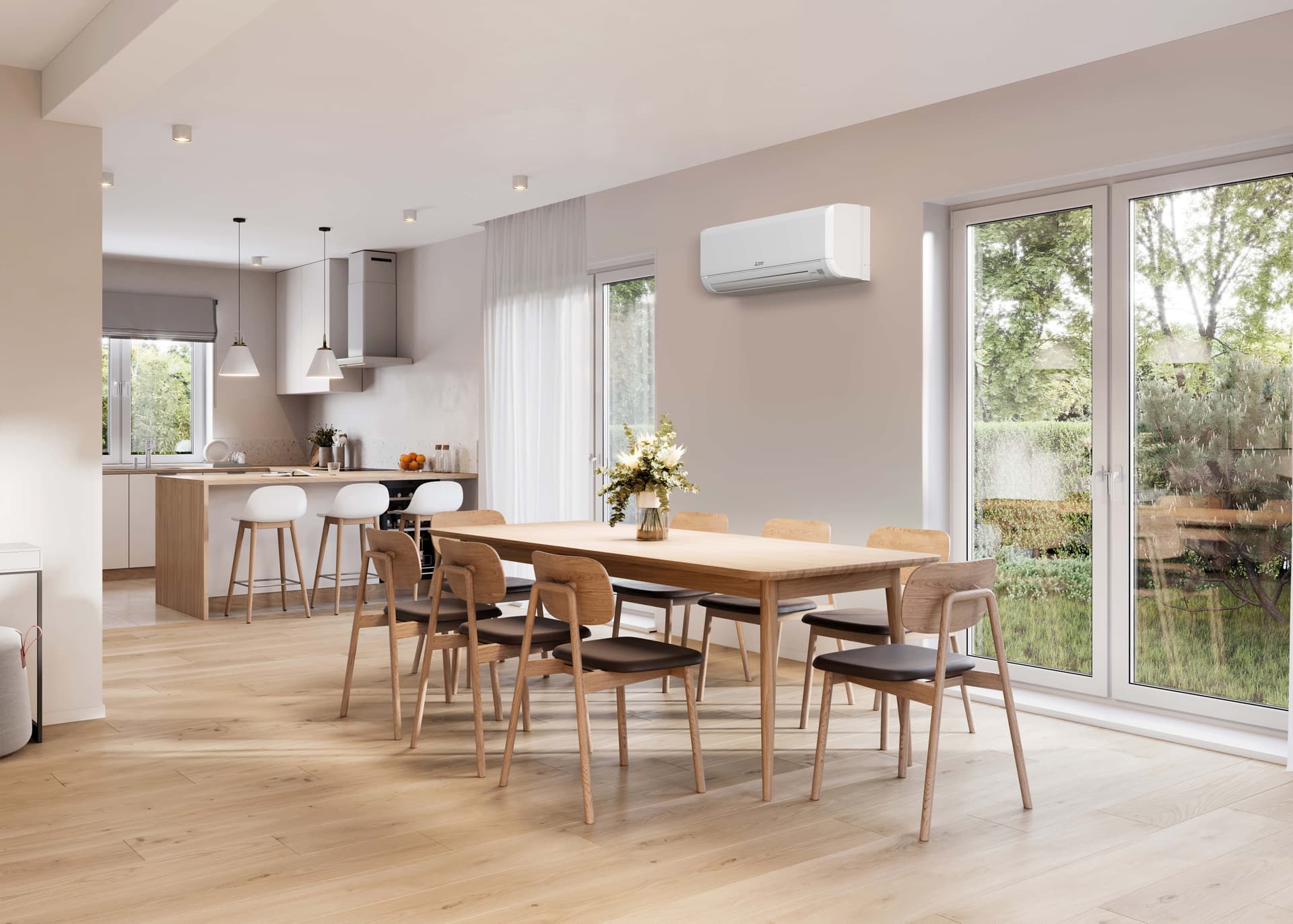 Modern open-plan kitchen and dining room with a wall-mounted ductless mini-split above the sliding glass doors, natural light and garden view