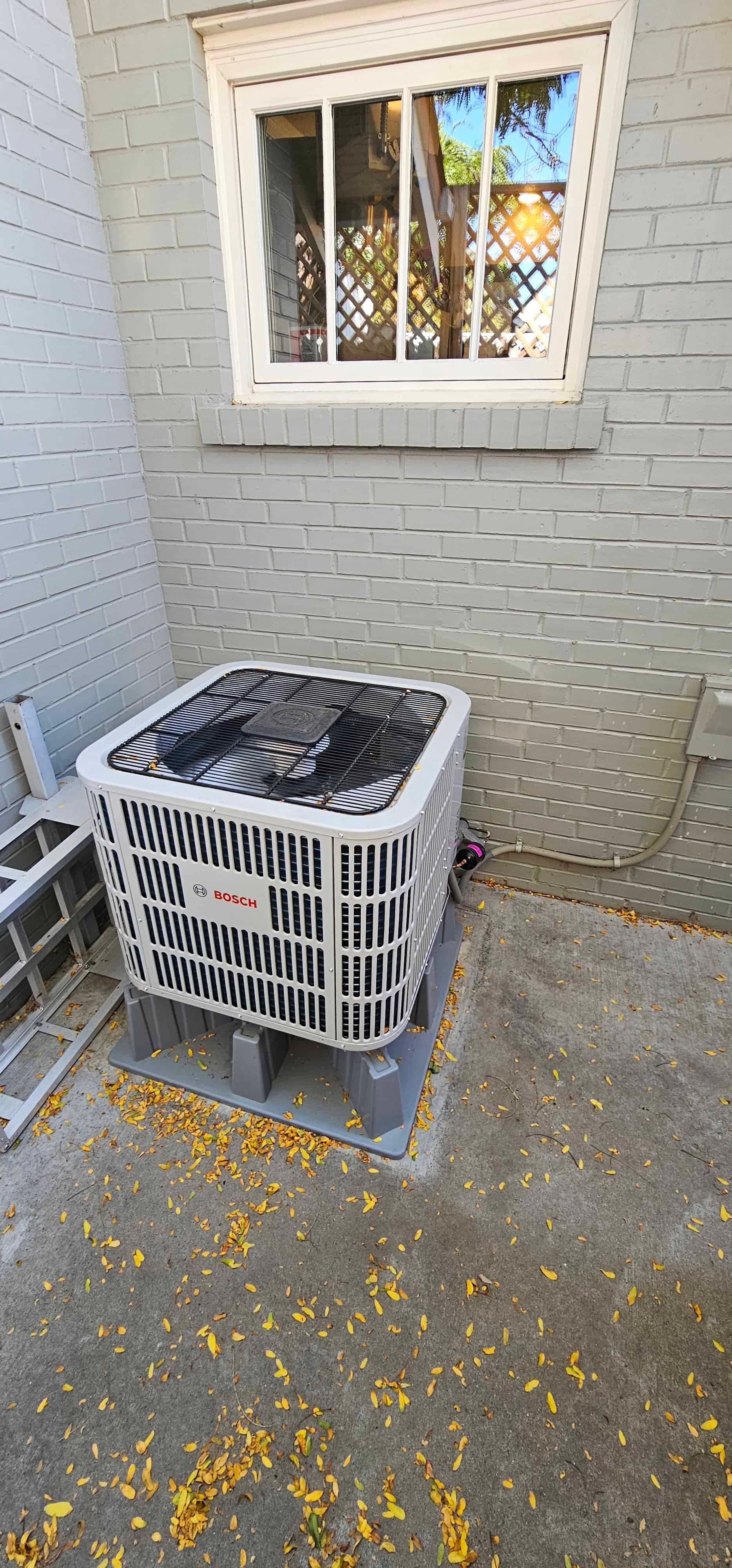 Bosch heat pump outdoor unit installation on concrete pad